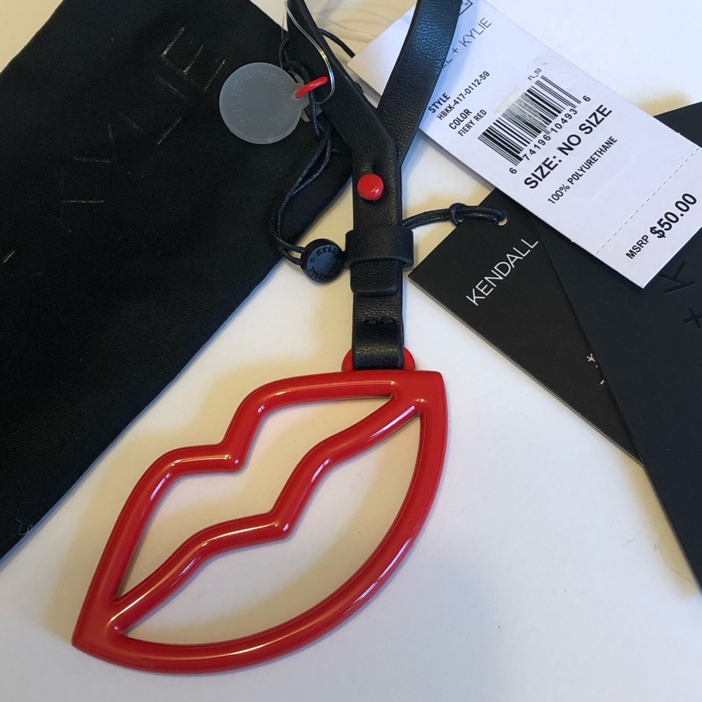 Kendall and Kylie red metal lips purse tag